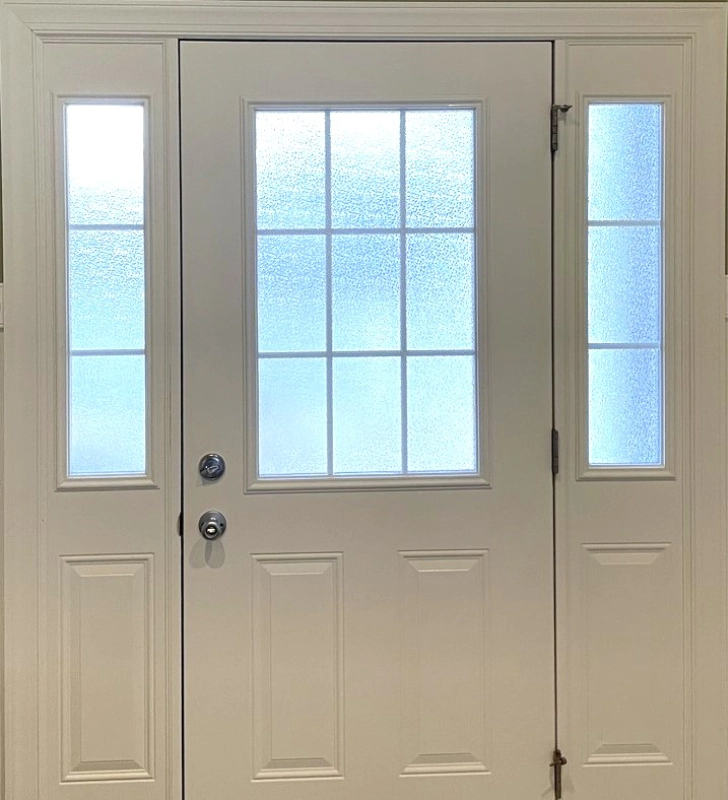 front door with textured film on windows